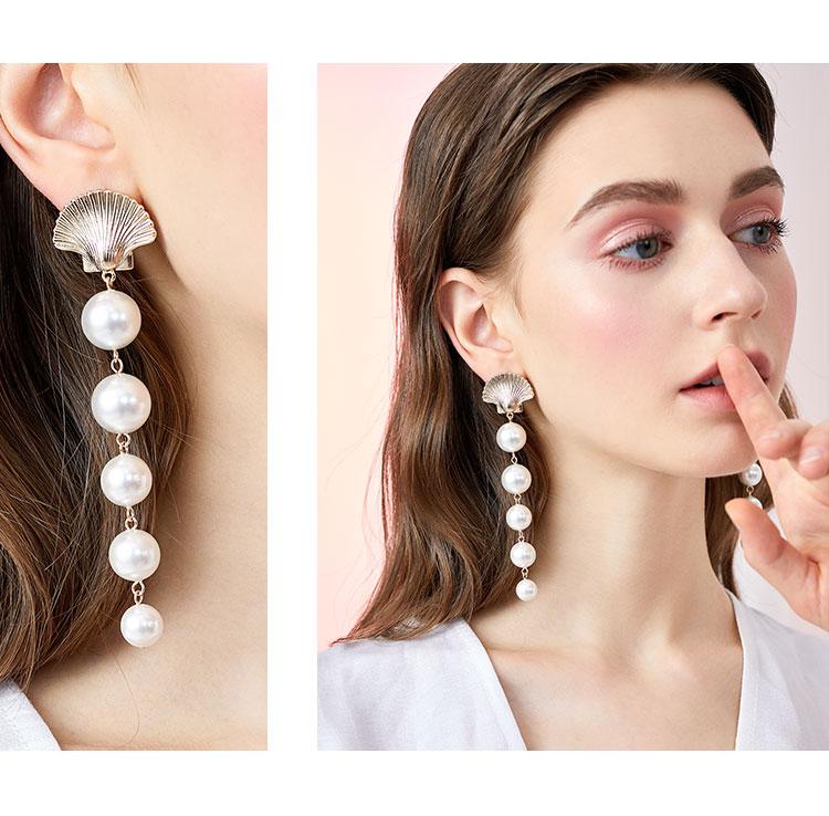 The design of Europe and the United States exaggerated cold wind temperament long mermaid tears metal shell imitation pearl earrings ear clip - dianjiang-