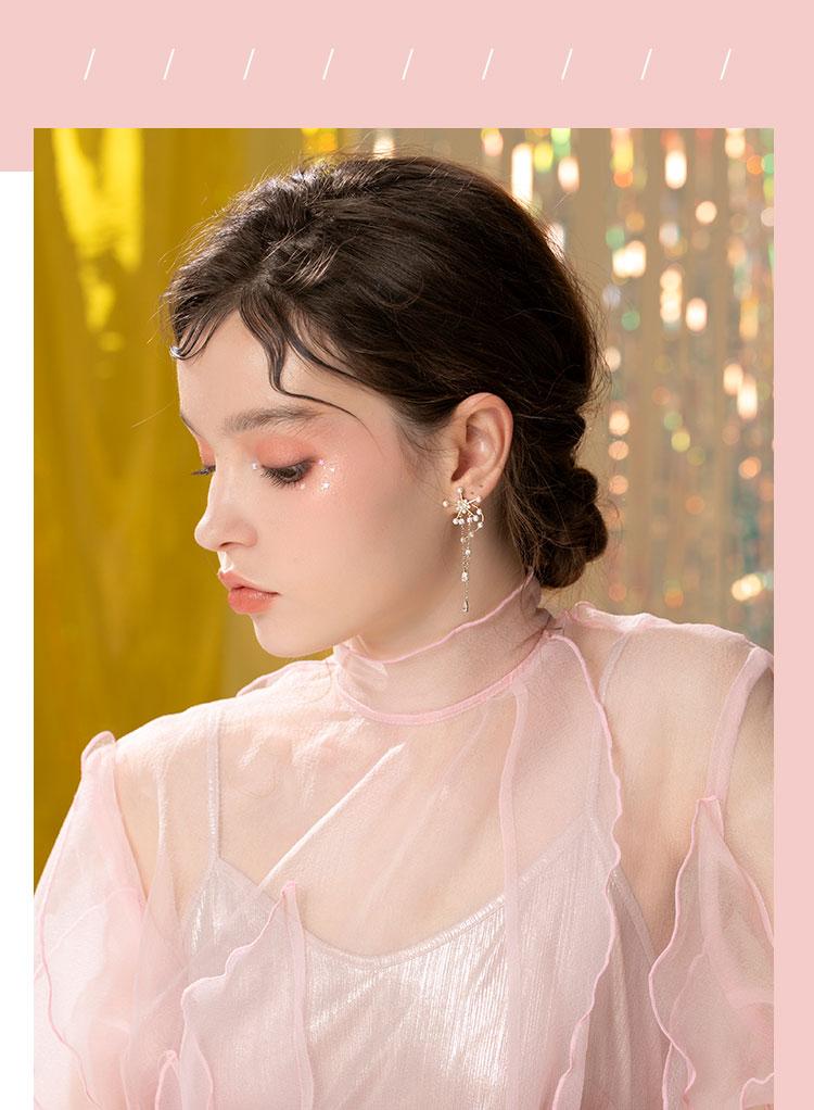 Original design Heavy Industries Windmill fringed pearl earrings ear clip earless women's high sense round face - dianjiang-