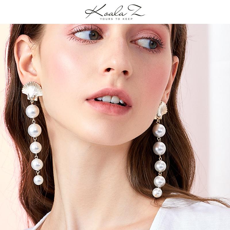 The design of Europe and the United States exaggerated cold wind temperament long mermaid tears metal shell imitation pearl earrings ear clip - dianjiang-