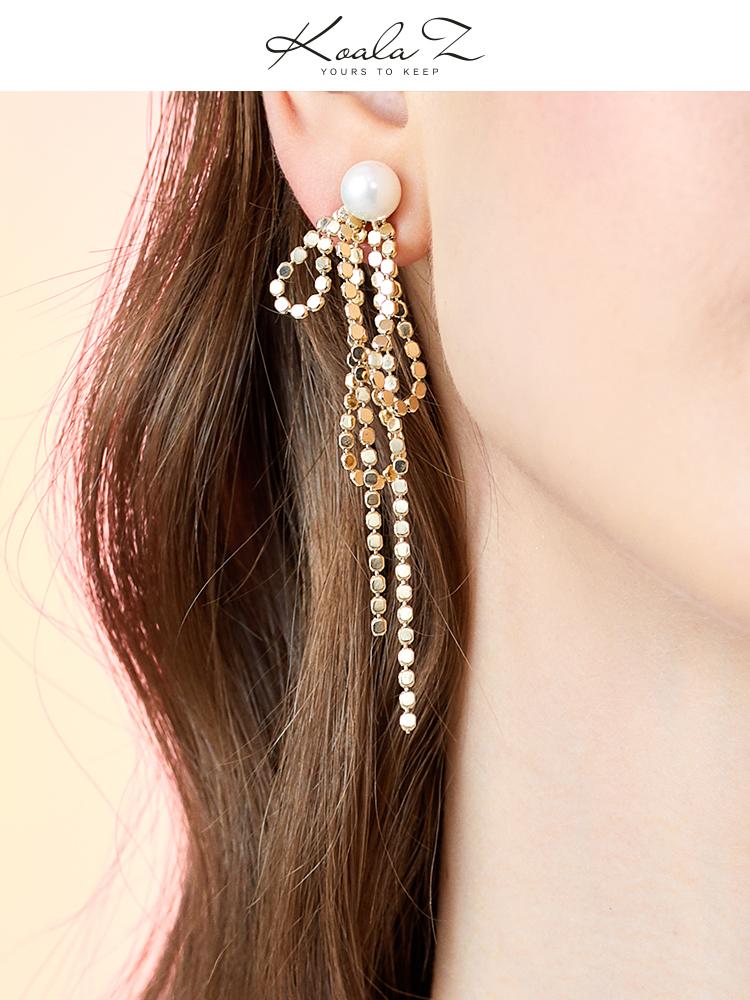 Design sense: round face, thin metal fringe, bow knot, pearl like long earring, ear clip, no ear hole, female Japan - dianjiang-