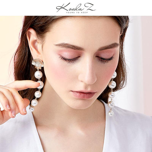 The design of Europe and the United States exaggerated cold wind temperament long mermaid tears metal shell imitation pearl earrings ear clip - dianjiang-