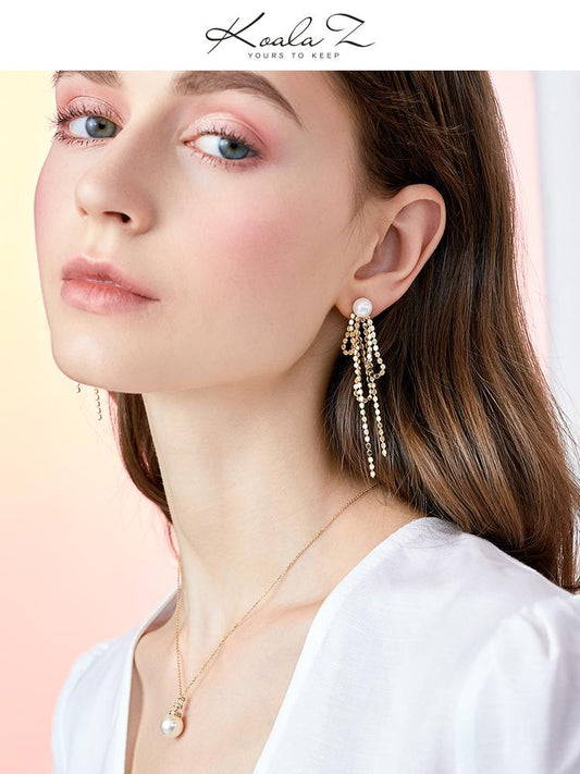 Design sense: round face, thin metal fringe, bow knot, pearl like long earring, ear clip, no ear hole, female Japan - dianjiang-